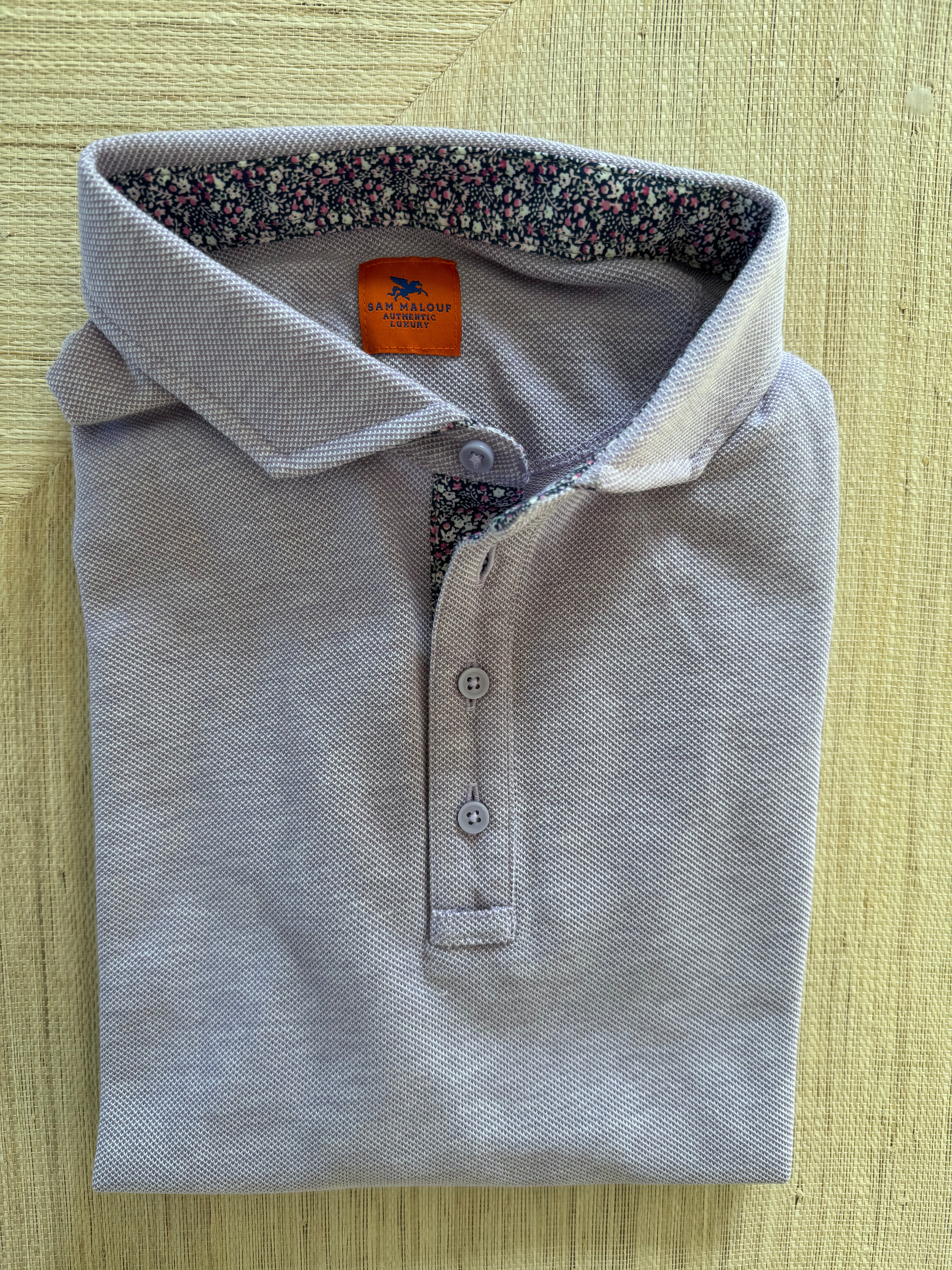 Polos with woven accenting